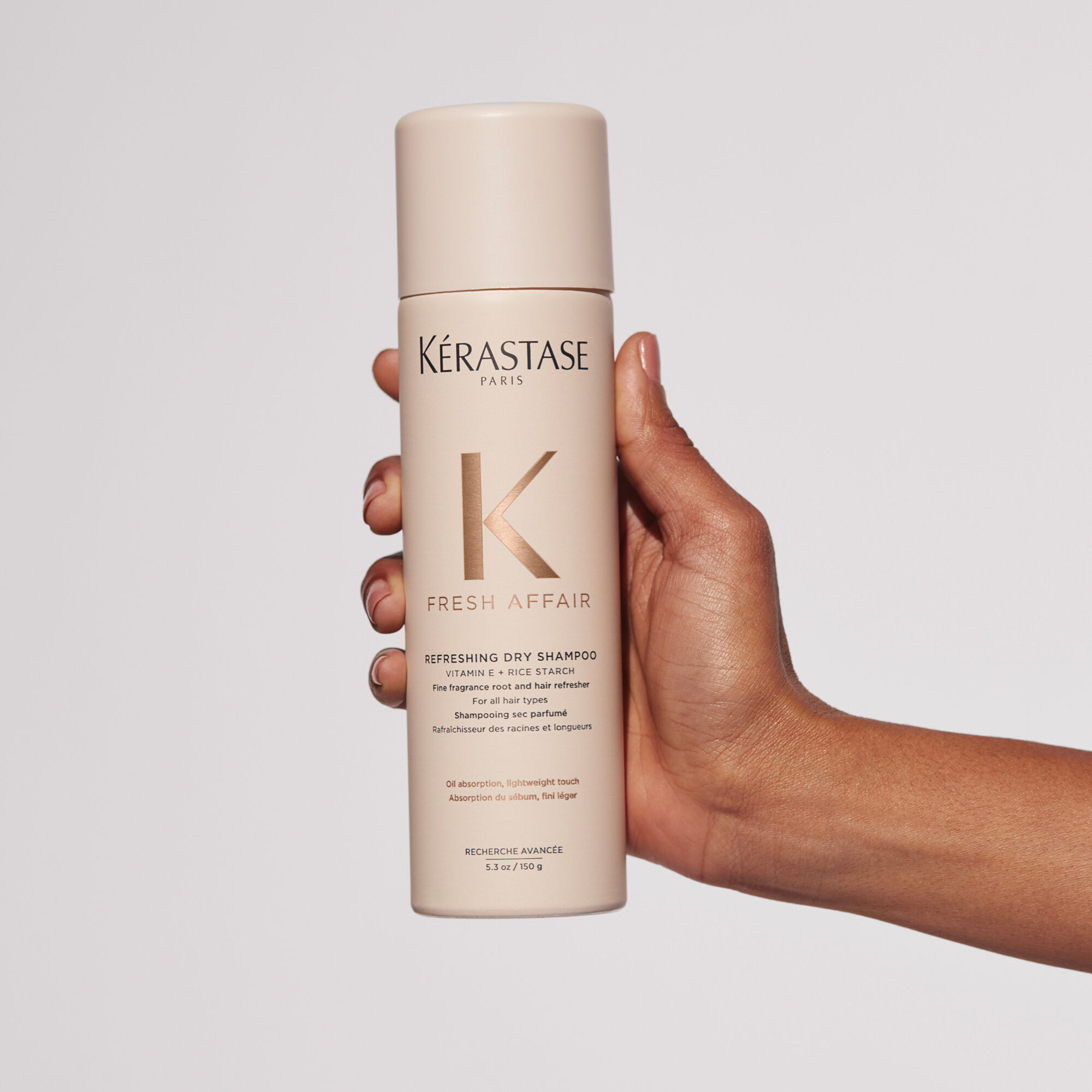 Kerastase Fresh Affair Dry Shampoo product in hand