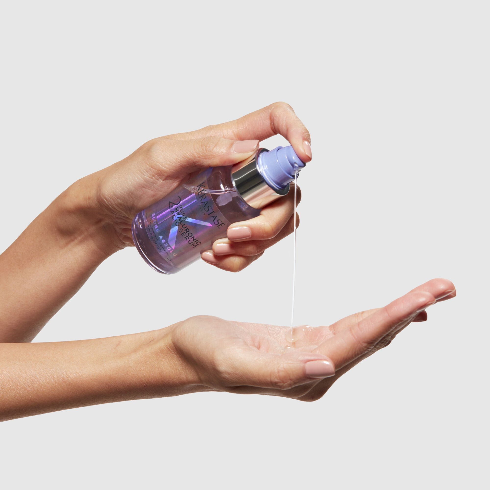 Kerastase Blond Absolu Cool-Tone Brightenting & Hydrating Hair Set in hand