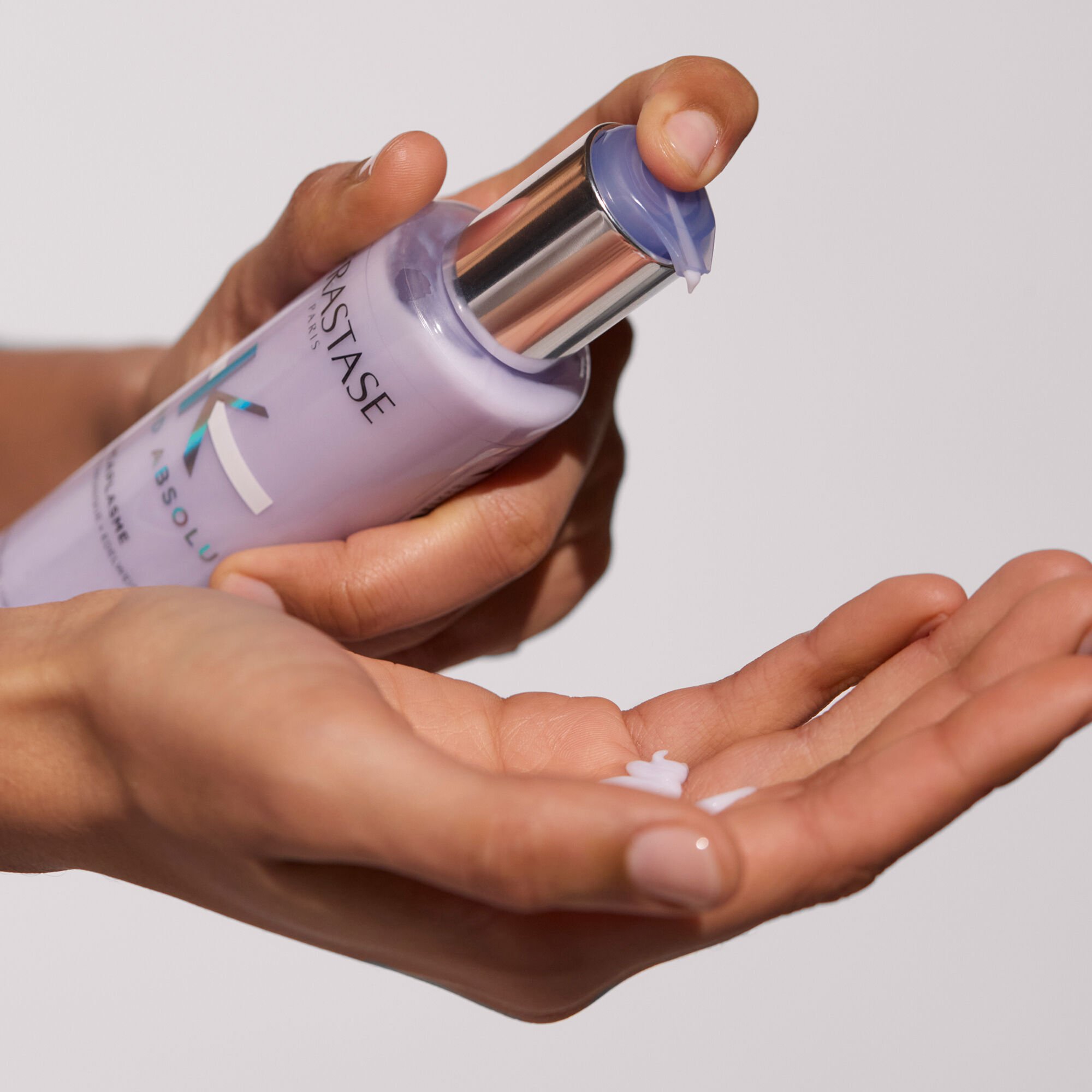 Kerastase Blond Absolu Daily Essentials For Honey Blonde Hair in hand