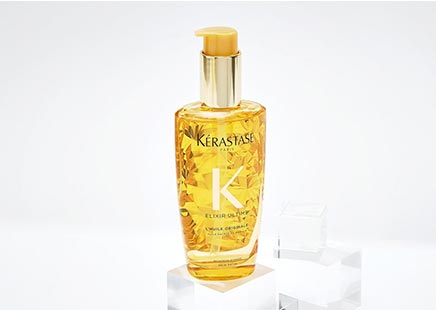 Kerastase Elixir Ultime Hair Oil Model Playing With Hair
